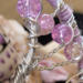 closeup of 8mm purple glass beads strung on wire branches